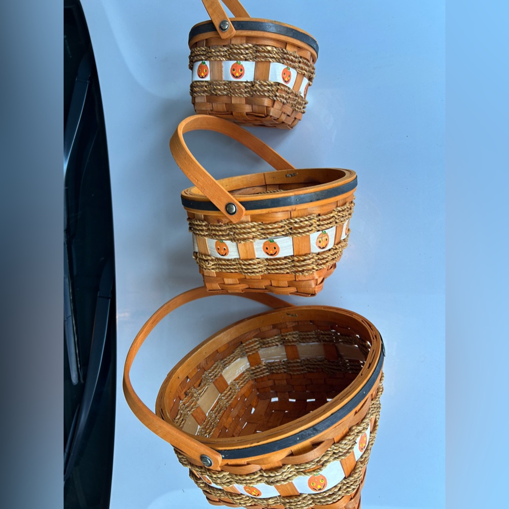 3 Halloween baskets w/ braided wicker woven in & painted pumpkins. Sm, Med. & Lg